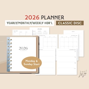 May include: A 2026 planner with a beige cover and a white interior. The planner includes yearly, monthly, and weekly layouts, with a classic disc binding. The cover displays the year 2026 and the words "Planner". Additional pages are visible, including calendars and note pages.