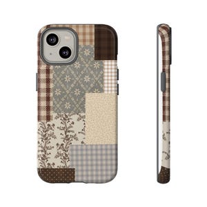 May include: A smartphone case featuring a patchwork design with various patterns including brown and beige plaid, floral motifs, small dots, and solid dark brown squares. The case displays a dual-camera cutout on the back and a slim side profile.