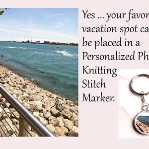 May include: A silver knitting stitch marker with a round glass charm featuring a photo of a rocky shoreline and blue water. The text "Yes... your favorite vacation spot can be placed in a Personalized Photo Knitting Stitch Marker." is visible in the background.