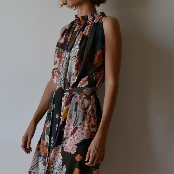 Oriental print cotton dress. High neck, loose fit, knee length. Sash belt. One size fits many.