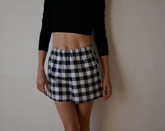 Womens black and white gingham checked culottes, shorts. Loose fit, high waisted, wide leg.