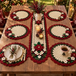 May include: A set of six round crocheted placemats and a matching rectangular table runner featuring a cream center, dark green border, and red scalloped edges. The set is decorated with crocheted poinsettia flowers, white blossoms, and red berries.