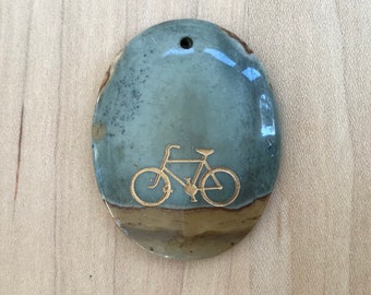 Succor Creek pendant stones with bicycle