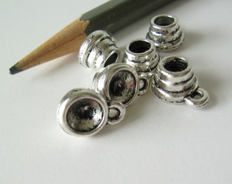 50 Tibetan silver charms findings or setting