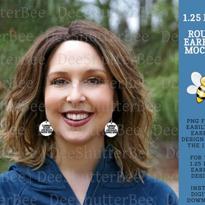 May include: A mockup of a woman wearing a pair of 1.25 inch round earrings. The earrings are white with black text that reads "EARRING FRAME ADD MAGIC UNDER HERE". The background is a blurred image of green foliage. The image also includes a cartoon bee with a blue background and text that reads "1.25 INCH ROUND EARRING MOCKUP PNG FRAME EASILY ADD EARRING DESIGN UNDER THE IMAGE FOR THE 1.25 INCH EARRING DESIGNS INSTANT DIGITAL DOWNLOAD".