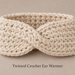 May include: A cream-colored ear warmer featuring a twisted crochet design with a thick, textured knit pattern. The text "Twisted Crochet Ear Warmer" is printed in a dark font below the accessory, which is made of yarn.