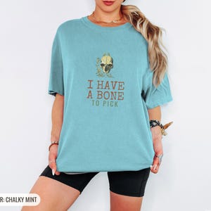 I Have A Bone To Pick Shirt, Skeleton Shirt for Book Lover, White Comfort Colors Tee Chalky Mint