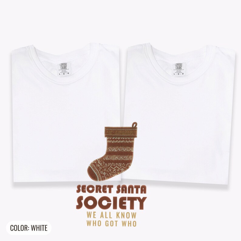 White Comfort Colors t-shirt printed with the words Secret Santa Society We All Know Who Got Who and a drawing of a knitted wool stocking stuffed with stick candy, two matching shirts