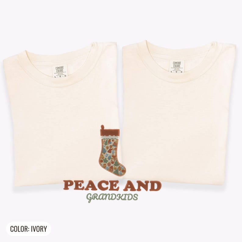 Ivory Comfort Colors t-shirt printed with the words Peace And Grandkids and a drawing of a classic knitted wool christmas stocking stuffed with small toys, two matching shirts