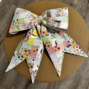 Stor quiltad lapptäcksrosett
