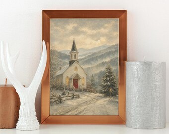 Puede incluir: Una lámina enmarcada de una iglesia blanca con campanario en un paisaje nevado, flanqueada por una escultura blanca con forma de cornamenta y una vela de pilar plateada con textura. La escena muestra montañas y un pino.