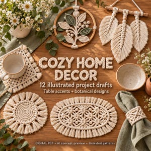 May include: A collection of macrame home decor items including a circular wall hanging with leaf motifs, three hanging feathers, a square coaster with a ceramic mug, a round coaster, an oval mat, and a napkin ring on a green cloth. Text reads: COZY HOME DECOR 12 illustrated project drafts Table accents + botanical designs DIGITAL PDF AI concept preview Untested patterns.