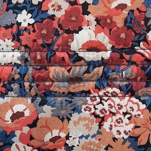 Détail de la trousse matelassée en tissu liberty of London Thorpe aux couleurs d'automne chatoyantes