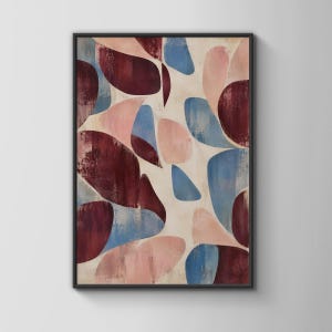May include: A rectangular wall art print featuring an abstract composition of organic, rounded shapes in shades of deep burgundy, soft dusty pink, and muted blue, all set against a light cream background, enclosed in a thin black frame.