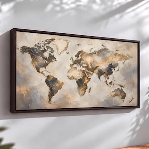 May include: A rectangular wall art piece featuring a world map in a palette of gold, charcoal gray, and cream. The continents are rendered with textured, abstract brushstrokes, framed in a dark brown wooden border, creating a layered effect.