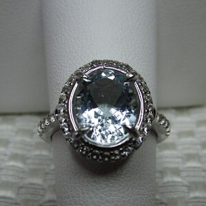 Oval Cut Aquamarine and Topaz Halo Ring in Sterling Silver - size 7                #3467