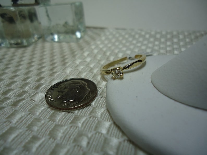 Round Cut White Diamond Ring in 14 karat Yellow Gold #1179