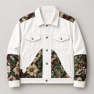May include: A white denim jacket featuring a button-up front, two chest pockets, and contrasting floral tapestry panels on the shoulders, lower front, and sleeves. The fabric panels display a dark green background with red and cream flowers.