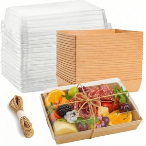 May include: A stack of rectangular brown paper food trays with clear plastic lids, accompanied by a bundle of brown twine. One tray is filled with assorted sliced fruits, cured meats, cheese, and edible flowers, tied with the twine.