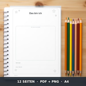 May include: A spiral-bound notebook page with the German text Das bin ich, a large rectangular frame, and lines for name and age. The page features star illustrations in the corners. Beside the notebook are seven colored pencils in a row.
