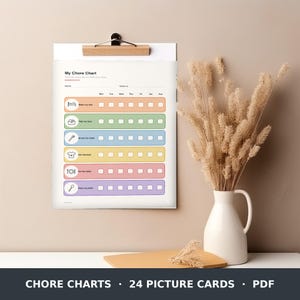 Könnte beinhalten: Ein weißer Aufgabenplaner aus Papier mit der Überschrift My Chore Chart, der sechs horizontale Reihen mit farbigen, abgerundeten Rechtecken in Orange, Grün, Blau, Gelb, Rosa und Lila zeigt. Jede Reihe enthält ein rundes Symbol, eine Aufgabenbezeichnung und sieben leere Kästchen.