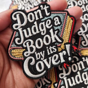 Patch Party Club, (1-pc) “Don’t Judge a Book by Its Cover” Patch, Size 3&quot;, Iron-On Embroidered Book Patch, Motivational Statement for DIY