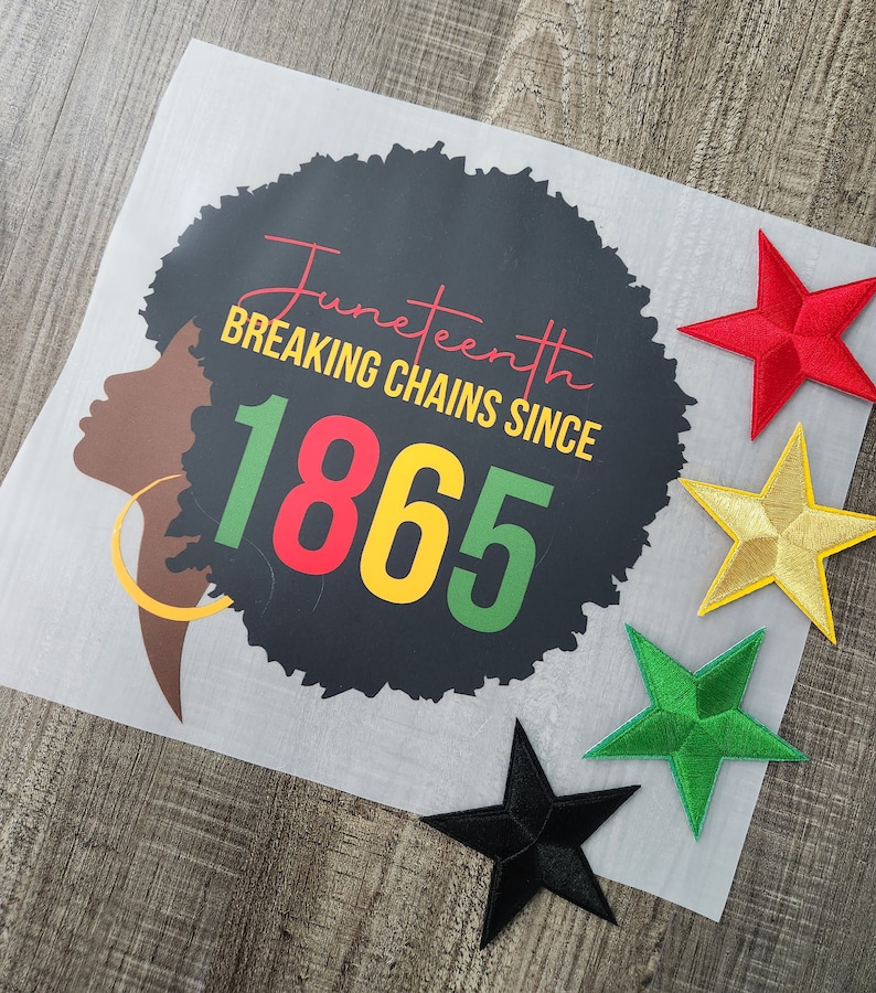 May include: A black and white illustration of a woman's face with an afro hairstyle. The text "Juneteenth Breaking Chains Since 1865" is written in red, yellow, and green. There are five colorful star-shaped patches in the background.