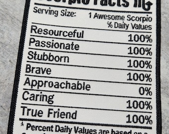 May include: A white patch with black text and a black border. The text reads "Scorpio Facts M" and lists traits of the Scorpio zodiac sign with a percentage value for each trait. The traits listed are: Resourceful, Passionate, Stubborn, Brave, Approachable, Caring, and True Friend. The text at the bottom reads "* Percent Daily Values are based on a Scorpio zodiac sign."