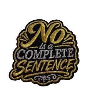 May include: A black embroidered patch featuring the gold-colored text 'No' in a script font, followed by the silver-colored text 'is a' and the word 'COMPLETE' in a bold font, with 'SENTENCE' in gold script and a silver decorative flourish.