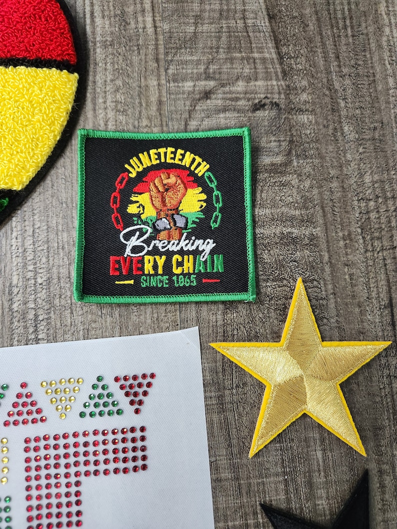 May include: A green, black, and red embroidered patch with the words "Juneteenth Breaking Every Chain Since 1865" and a raised fist.
