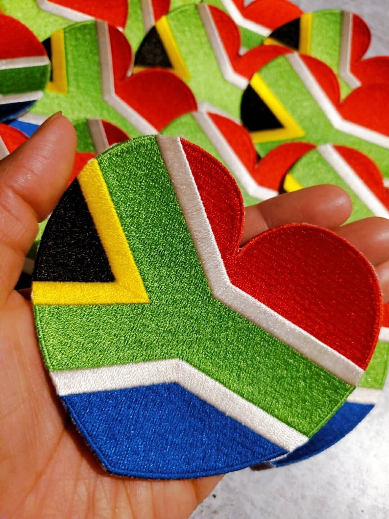 A heart shaped South African flag iron on patch