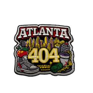 May include: An embroidered patch featuring the text ATLANTA in white letters on a red background above a yellow city skyline. The number 404 is centered in large yellow font. Below are a grey high-top sneaker, a red apple, a stack of green cash, a gold chain, and a purple drink cup.