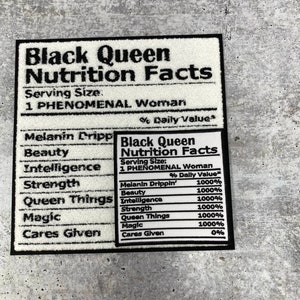 May include: A rectangular black and white patch featuring the text "Black Queen Nutrition Facts." The patch lists "Melanin Drippin'," "Beauty," "Intelligence," "Strength," "Queen Things," and "Magic" with 1000% daily value.