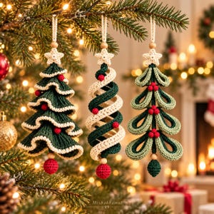 May include: Three crocheted Christmas tree ornaments hanging from a branch. The first is a dark green ruffled tree with cream edges and red berries. The second is a spiral tree in cream and dark green. The third is a light green looped tree.