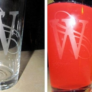 May include: Two clear glass cups with a frosted "W" design. One cup is filled with a bright red liquid, and the other is filled with a bright yellow liquid.