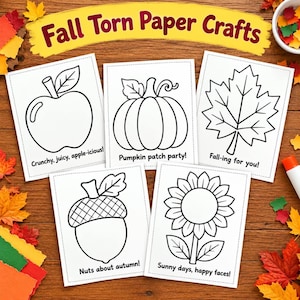 May include: Five white rectangular cards with black line art illustrations of an apple, pumpkin, leaf, acorn, and sunflower. Each card features text: Crunchy, juicy, apple-icious!, Pumpkin patch party!, Fall-ing for you!, Nuts about autumn!, and Sunny days, happy faces!