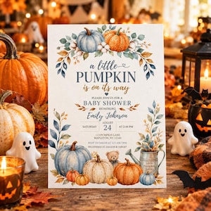 May include: A rectangular baby shower invitation card featuring watercolour illustrations of pumpkins, cotton, and leaves. The text reads: A little PUMPKIN is on its way, PLEASE JOIN US FOR A BABY SHOWER HONOURING Emily Johnson, SATURDAY AUGUST 24 AT 2:00 PM.