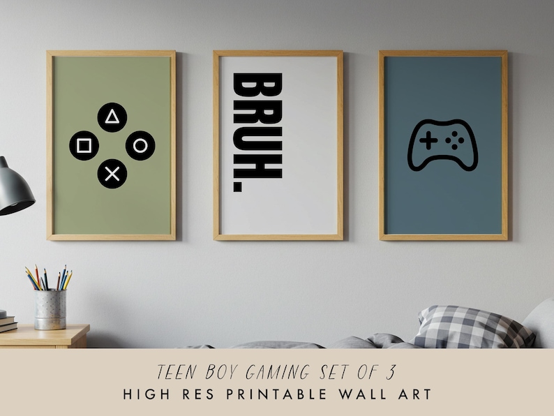May include: Set of three framed prints with a gaming theme. One print features black controller buttons on a green background. Another says "BRUH." in bold black letters. The third has a controller icon on a blue background.