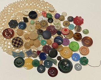 mixed selection of vintage buttons, glass , Bakelite, plastic ,metal & fabric