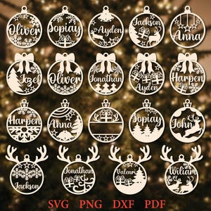 May include: A collection of nineteen laser-cut wooden Christmas ornaments featuring various holiday motifs including snowflakes, reindeer, gift boxes, bells, and bows, with personalized names such as Oliver, Sopiy, Ayden, and Jackson.