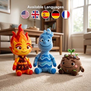 May include: Three crocheted plush figures: a flame-shaped character in red, orange, and yellow; a blue water-inspired character with wavy patterns; and a round brown earth-themed character with small green sprouts and gray stones on top.