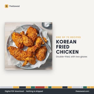 May include: A metal plate lined with white parchment paper holds several pieces of golden-brown crispy fried chicken, accompanied by a silver fork. Text reads: ONE OF 75 RECIPES KOREAN FRIED CHICKEN Double-fried, with two glazes. TheSawad.