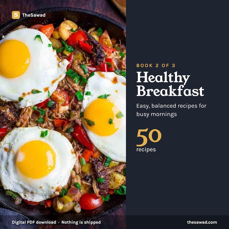 May include: A digital cookbook titled Book 2 of 3 Healthy Breakfast Easy, balanced recipes for busy mornings 50 recipes. The cover features a cast iron skillet filled with a hash of fried eggs, red peppers, potatoes, and green onions.
