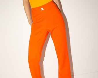 70's COURREGÈS Hyperbole logo flares / wide leg pants / tangerine orange / stretch knit / numbered label / France