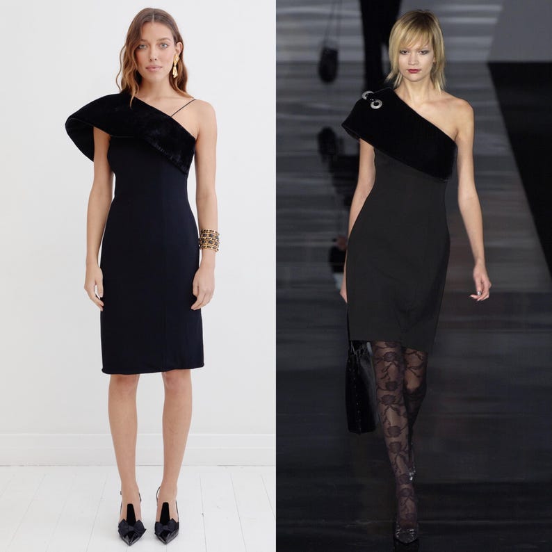 May include: Two models wearing black one-shoulder dresses with a black velvet overlay. The dress on the left has a gold bracelet. The dress on the right has a silver embellishment on the shoulder.