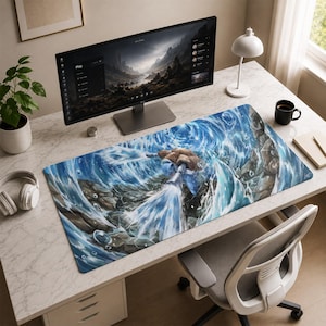 May include: A rectangular desk mat featuring a blue turtle-like creature with cannons on its back, spraying powerful jets of water amidst swirling blue waves and rocky terrain, displayed on a white marble-patterned desk surface.