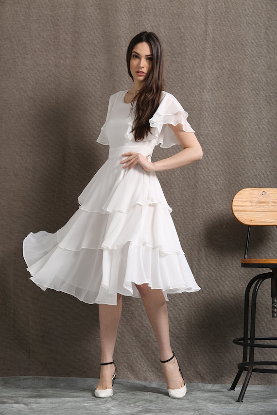 white frilly dress