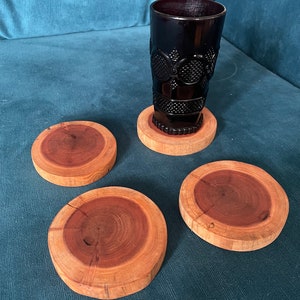 4 Redwood Coaster ~4 1/2”-5”in diameter + 1/2” thick sanded smooth beautiful wood grain very unique All natural tung oil finish