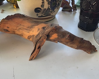 Wood sculpture sanded to an extremely smooth finish looks like a finger made beautiful unique 10” approximately comes with air plant