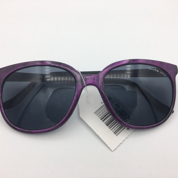 NUEVAS gafas de sol BOLLE ACRYLEX 396 en color morado con marco estampado en negro y lentes grises. Un poco de polvo por haber estado guardadas. Vintage de los años 80